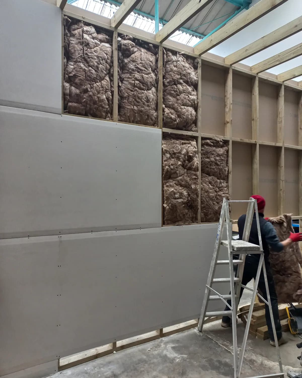 Timber frame and insulation during interior construction