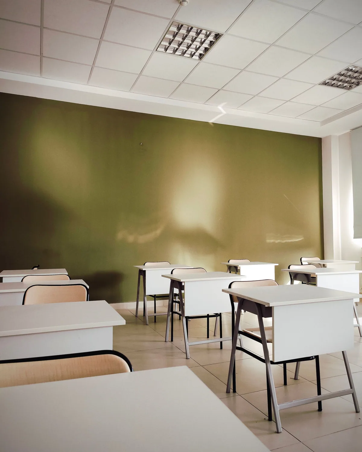 Modern classroom interior with desks and chairs